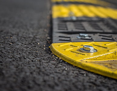 close-up photo of yellow and black metal covers thumbnail
