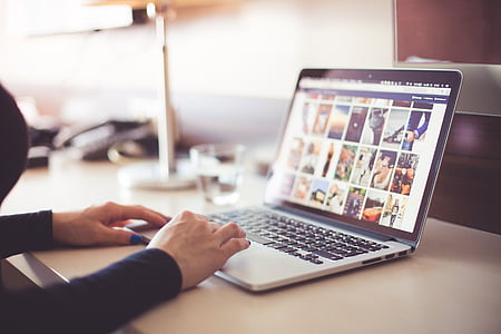 person using a laptop thumbnail