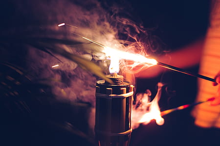 person lighting firecracker thumbnail