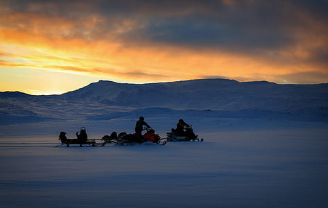 person riding snowmobile thumbnail