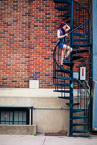 Woman on Spiral Stairs thumbnail