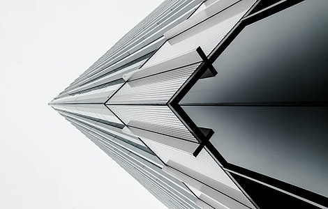 low angle photography of gray building at daytime thumbnail