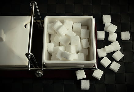 sugar cubes lot on white ceramic bowl thumbnail