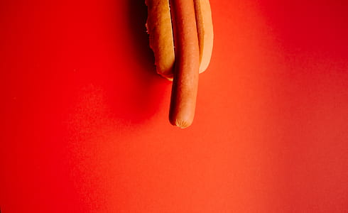 closeup photography of hotdog with bun thumbnail