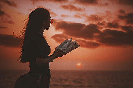 Reading with sunset thumbnail