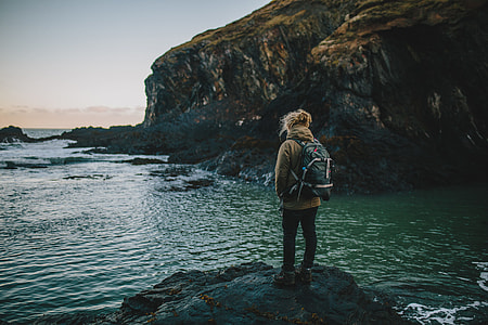 person standing on boulder thumbnail