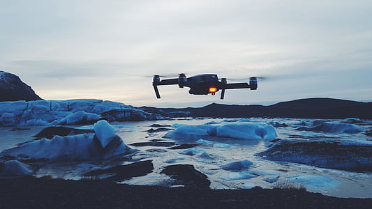 flying black drone thumbnail