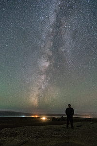 man standing on seashore thumbnail