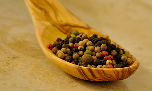 beads on brown wooden spoon thumbnail