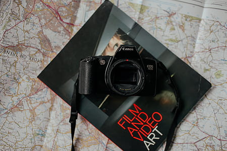 black Canon EOS bridge camera thumbnail