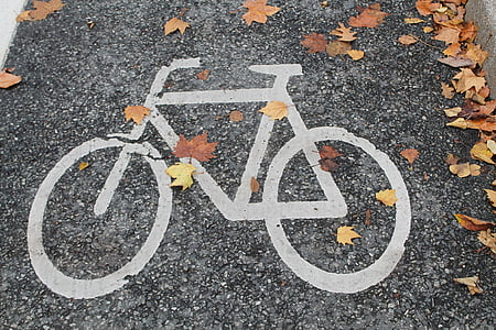 white bicycle sign ground thumbnail