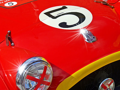 close-up photography of red vehicle thumbnail