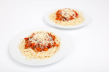 two plates of cooked spaghetti thumbnail