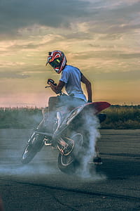 Photo of Man Riding Motorcycle thumbnail