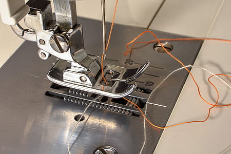 gray metal sewing machine part thumbnail