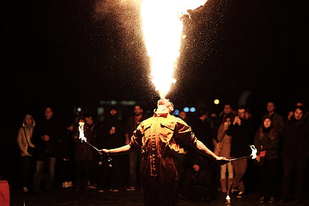 man spitting fire photography thumbnail