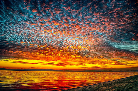 brown Sand in beach during sunset thumbnail