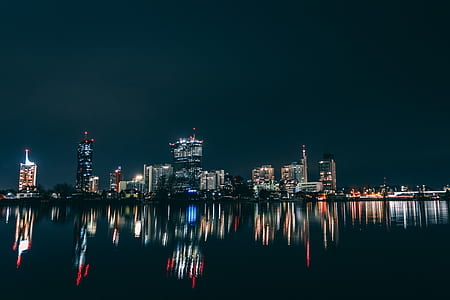 landscape of city buildings during night thumbnail