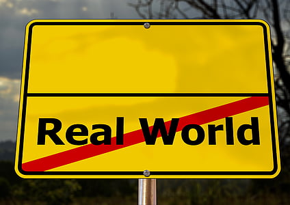 Real World signage on silver post thumbnail