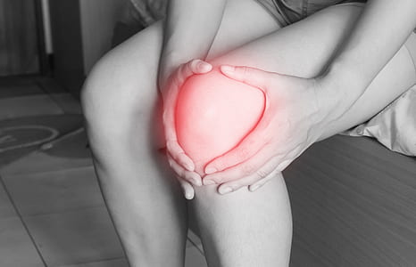 person holding knee thumbnail