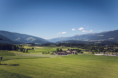Green Grass Field Under Blue Sky thumbnail
