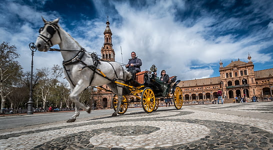 people riding on carriage in front of church during daytime thumbnail