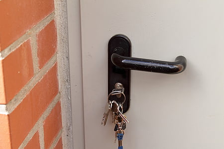 silver keys in door handle thumbnail
