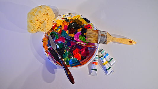 paint brush beside paint tube thumbnail