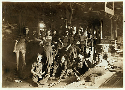 grayscale photography of group of people inside building thumbnail
