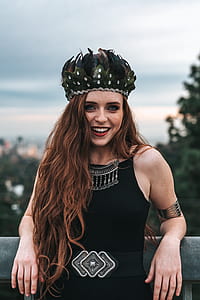 woman wearing black dress with tiara thumbnail