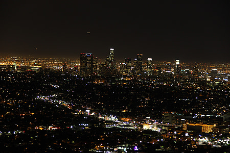 photo of high-rise buildings during night time thumbnail
