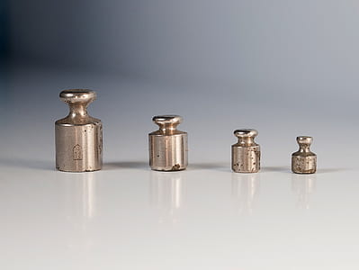 four gray metal tools on white surface thumbnail