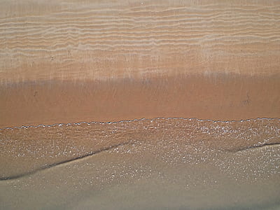 photo of sea waves crashing on seashore thumbnail