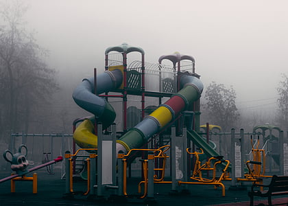 orange and multicolored tube slide playground thumbnail