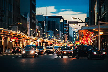 cars at the road during night time thumbnail