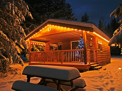 gray picnic table near brown wooden house thumbnail