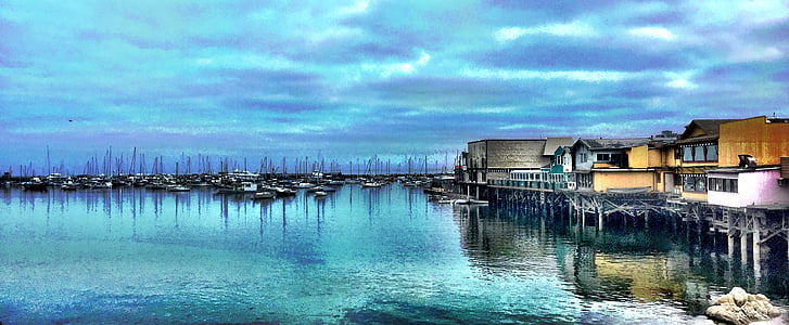 houses near body of water during daytime thumbnail