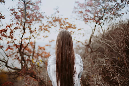 photo of woman in white and gray stripe shirt thumbnail