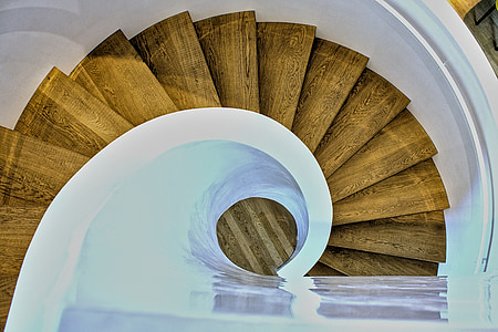 brown wooden spiral stairs photography thumbnail