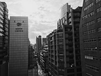 high-rise building under white sky thumbnail