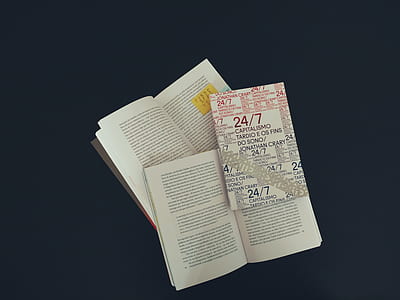 two opened books close up photo thumbnail