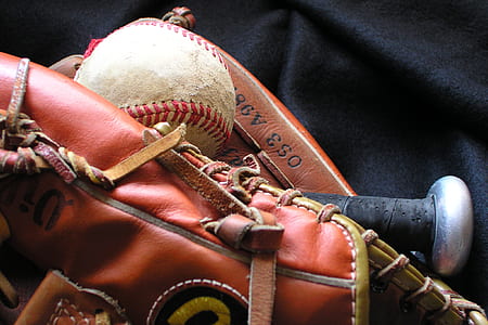 brown Rawlings leather baseball mitt with baseball bat and ball thumbnail