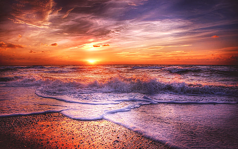 time lapse photography of body of water during golden hour thumbnail