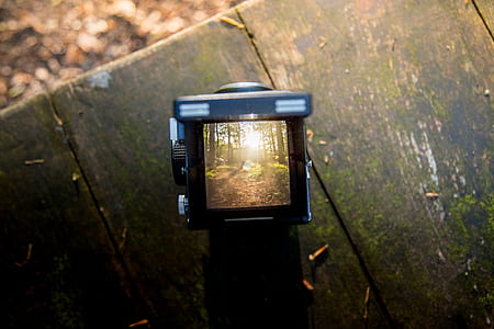Black Camera on Brown Wooden Table thumbnail