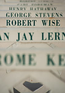 selective focus photograph of Robert Wise printed white surface thumbnail