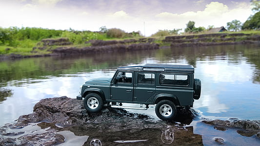 close-up photo of gray Jeep car toy thumbnail