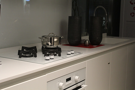 gray steel pot on gas range thumbnail