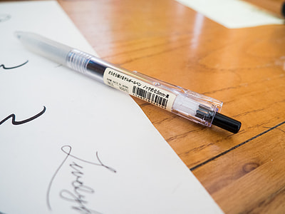 closeup photo black click pen thumbnail