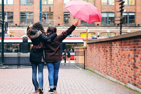 Couple Walking In Rain Photo thumbnail