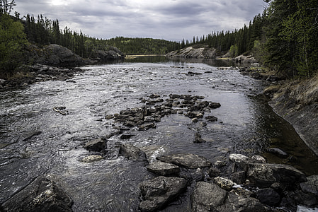 Landscape and Scenery of the Cameron River under clouds and forest thumbnail